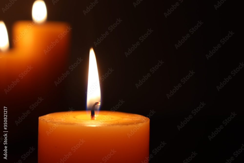 Candle black background of mourning funeral moment of silence Candle black background of mourning funeral moment of silence