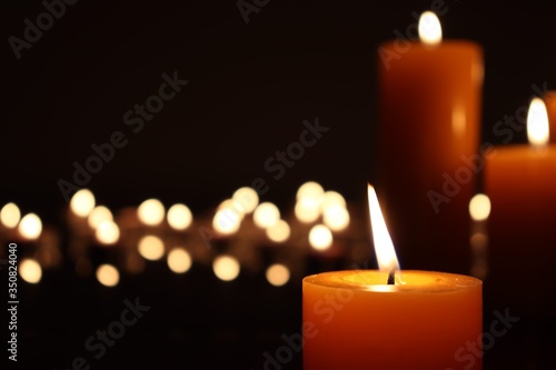 Candle black background of mourning funeral moment of silence	