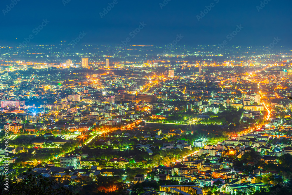 Obraz premium Beautiful of Landscape View cityscape over The color of the lights and city center of Chiang mai,Thailand at twilight night background.