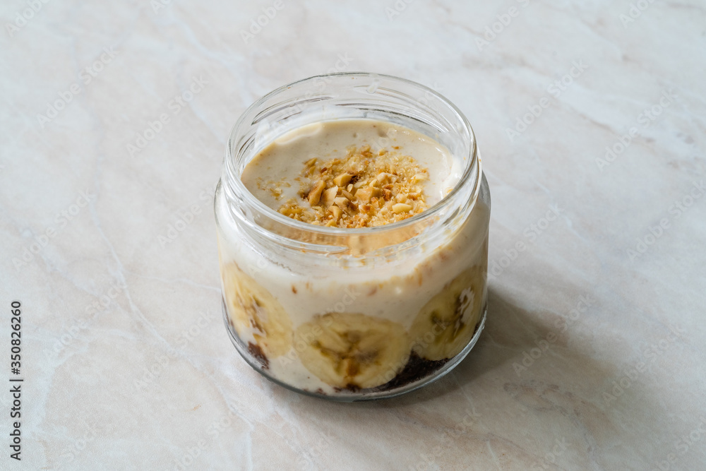 Homemade Banana Custard Pudding with Almond Milk, Chocolate Cake Gluten Free, Vegan and Hazelnut Powder Topping / Turkish Magnolia Dessert. Homemade Banana Custard Pudding with Almond Milk, Chocolate Cake Gluten Free, Vegan and Hazelnut Powder Topping / Turkish Magnolia Dessert.
