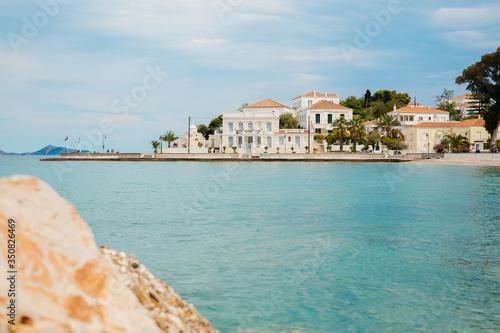 Greek island Spetses, the embankment of the old town with beautiful houses on the sea