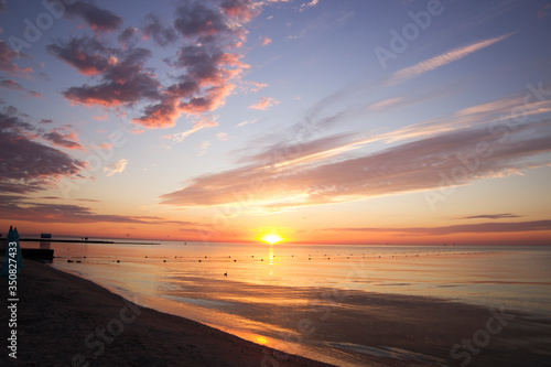 Summer sunset on the beach of the sea. Odesa, Ukraine