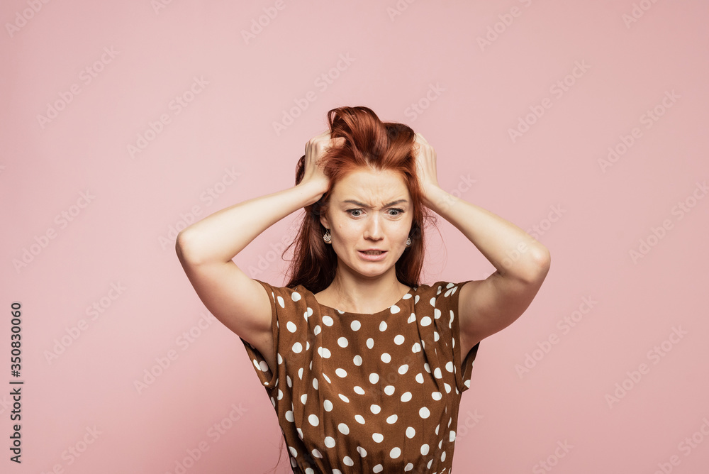 Crying emotional angry woman screaming on pink studio background. Emotional, young face. Female half-length portrait Crying emotional angry woman screaming on pink studio background. Emotional, young face. Female half-length portrait