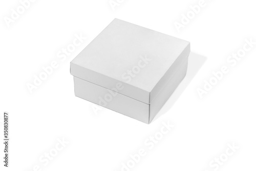 Blank white box isolated on a white studio background, copyspace for advertising. Ready for your graphics. Shopping, shipping, packing, delivery. Paperboard, cardboard for transportation and recycling
