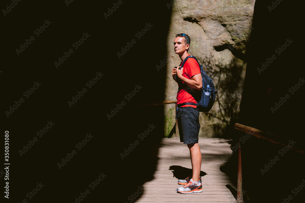 Young male hiker with backpack. Active healthy lifestyle adventure journey vacations. photo with space for your montage