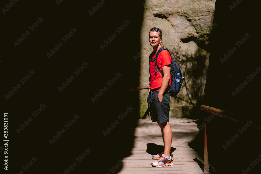 Young male hiker with backpack. Active healthy lifestyle adventure journey vacations. photo with space for your montage