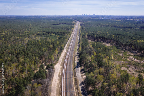 Drone view of railroad tracks between Legionowo town and Choszczowka district of Warsaw, Poland