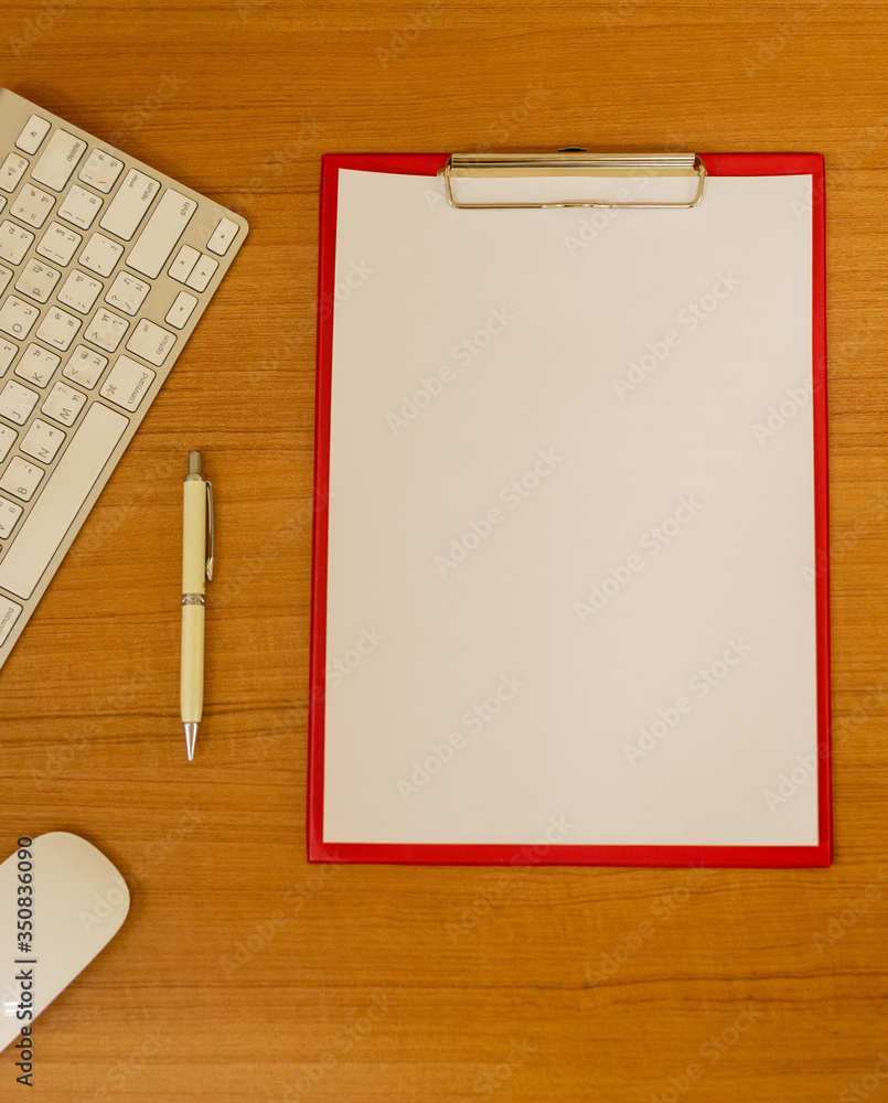Working table with note paper and accessories on the wooden table background. View from above. Working table with note paper and accessories on the wooden table background. View from above.