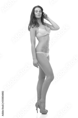 young girl with slender body posing in underwear