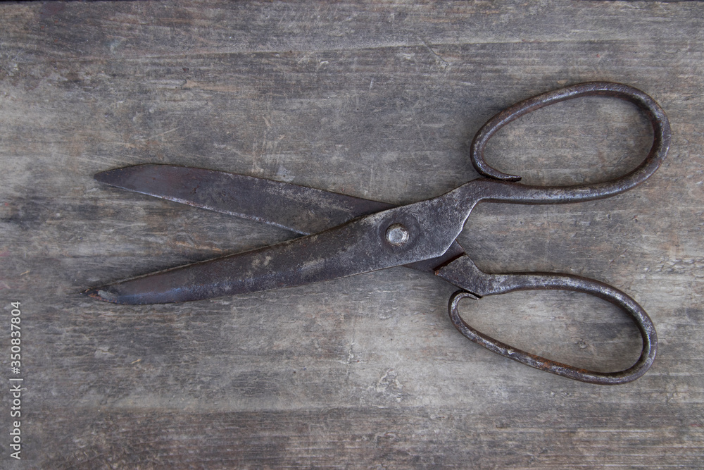 Old scissors for cutting thin materials and fabrics. Old scissors for cutting thin materials and fabrics.