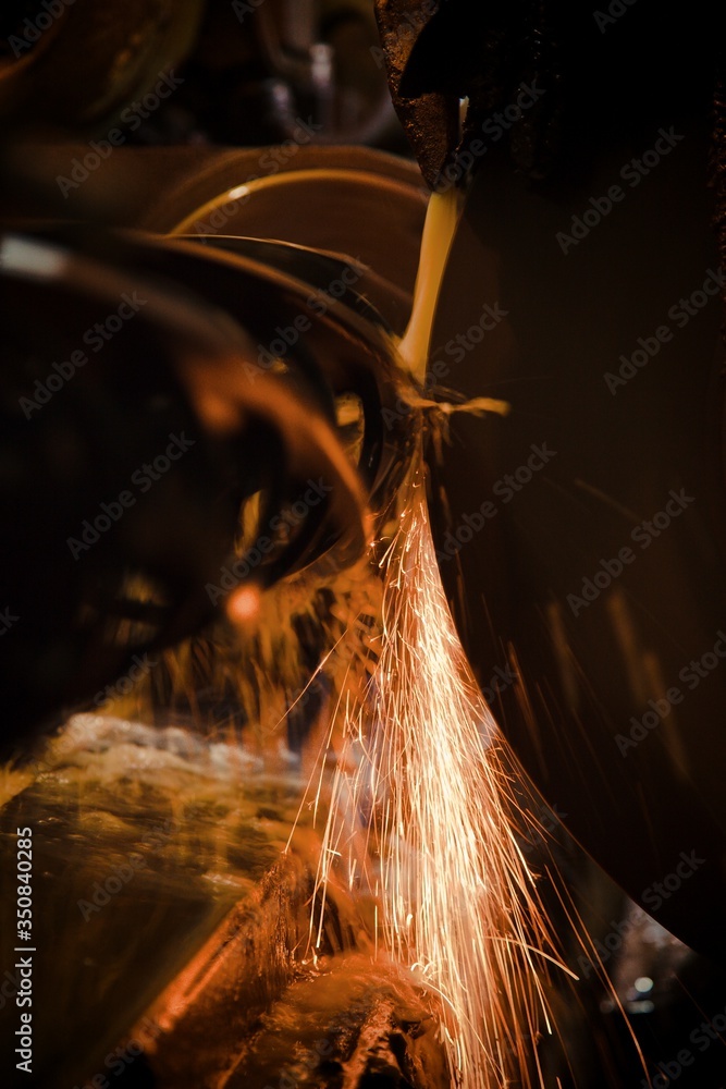 sparks from a grinder machine metal work sparks from a grinder machine metal work