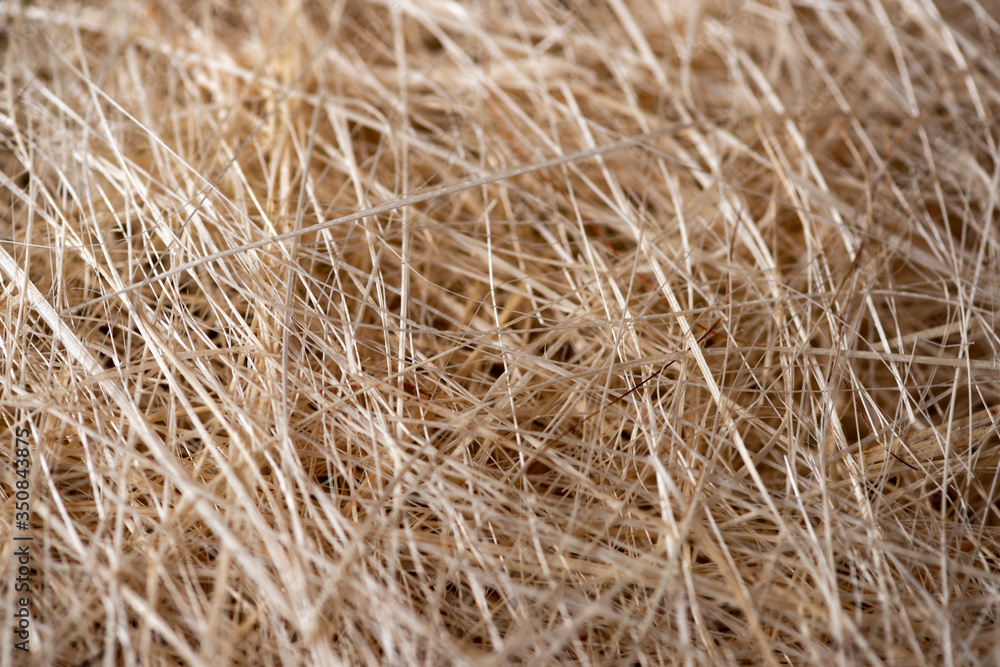 Natural texture of straw. Craft packaging. Coconut coir Natural texture of straw. Craft packaging. Coconut coir