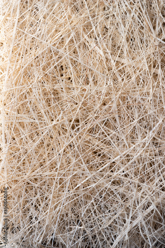 Natural texture of straw. Craft packaging. Coconut coir Natural texture of straw. Craft packaging. Coconut coir