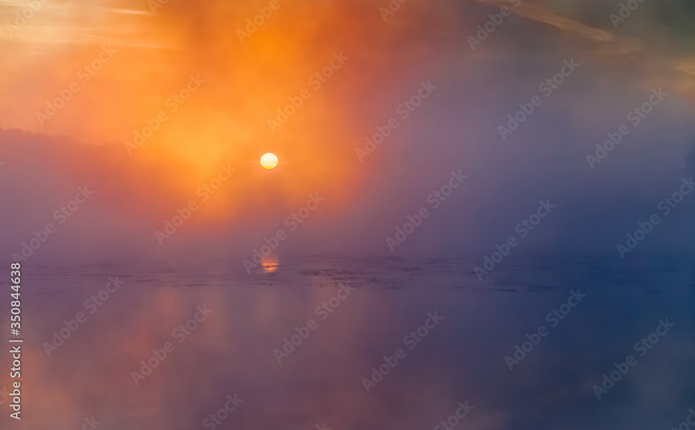 Mist over the lake dawn early morning in the summer Mist over the lake dawn early morning in the summer