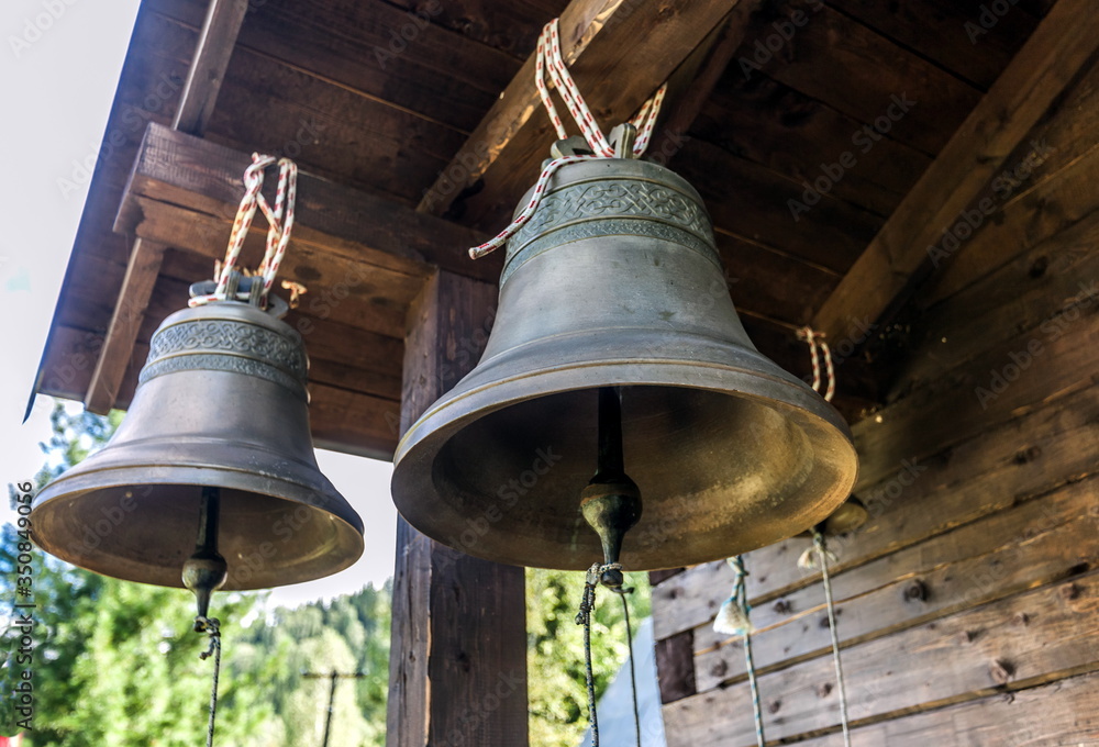 The bells of the chapel in the Siberian taiga