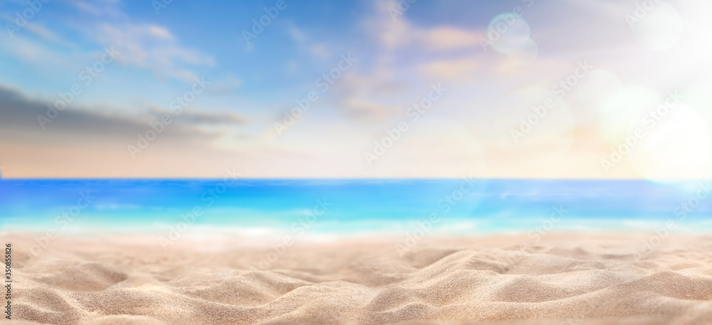 A summer vacation, holiday background of a tropical beach and blue sea at sunset.