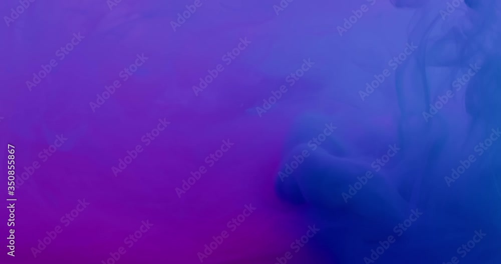 Dark blue paint drops moves down ink purple background colored abstract smoke explosion outburst vibrant animation holi slow motion Dark blue paint drops moves down ink purple background colored abstract smoke explosion outburst vibrant animation holi slow motion