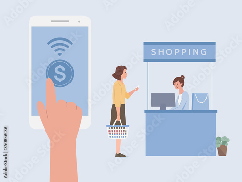 One fingure touching on mobile screen for using online Payment to pay money in front of Cash register at the cashier of a shopping center. Women holding Shopping basket standing to wait payment bill. 