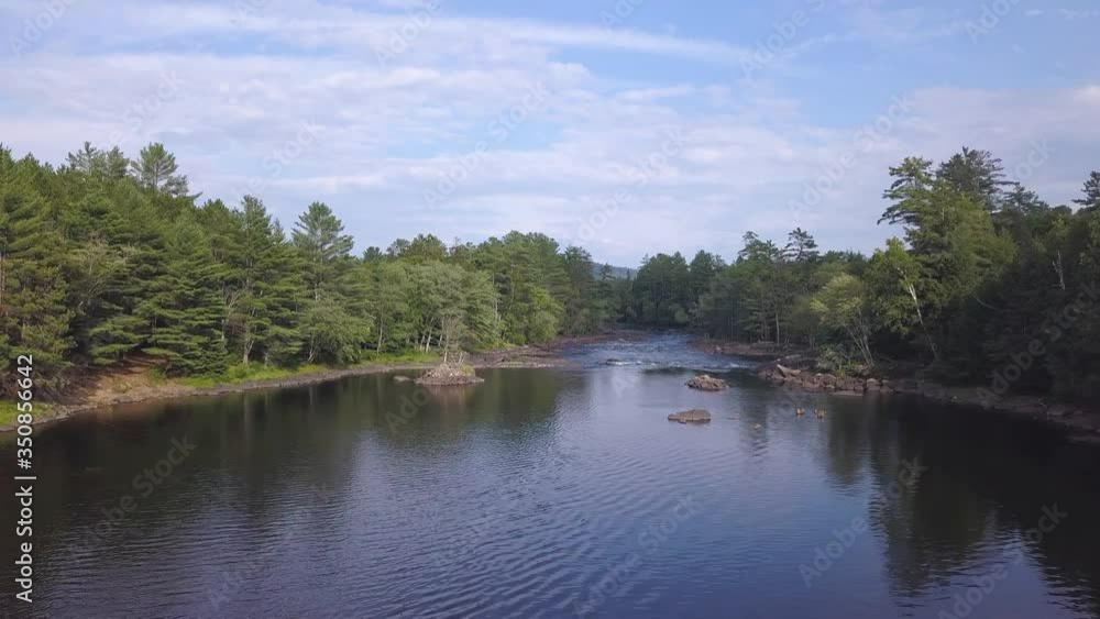 Aerial drone shot flying up to reveal the beautiful landscape of Algonquin Park, Ontario, Canada. Aerial drone shot flying up to reveal the beautiful landscape of Algonquin Park, Ontario, Canada.