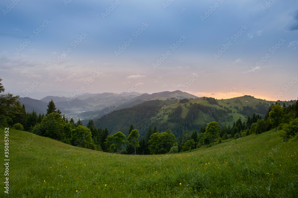 Obraz premium Majestic view on beautiful fog mountains in mist landscape. Dramatic unusual scene. Travel background. Exploring beauty world. Carpathian mountains. Ukraine. 