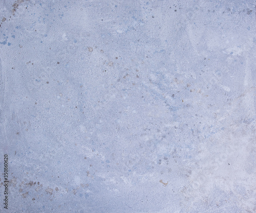 Background for photography. Mottled and painted whit tones of white and blue spotted.