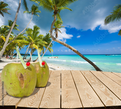 Wooden tabletop with coconu...