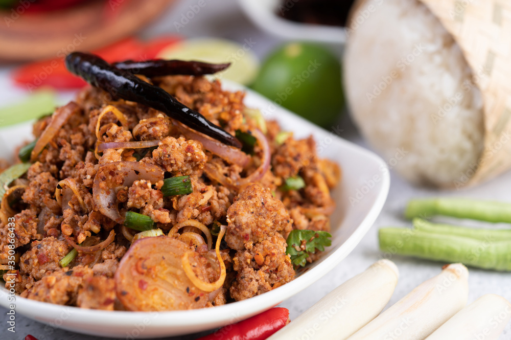 Spicy minced pork in a white plate. Spicy minced pork in a white plate.