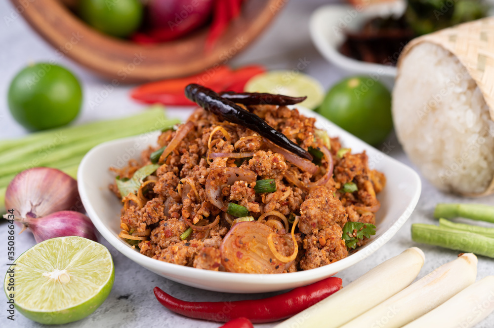 Spicy minced pork in a white plate. Spicy minced pork in a white plate.