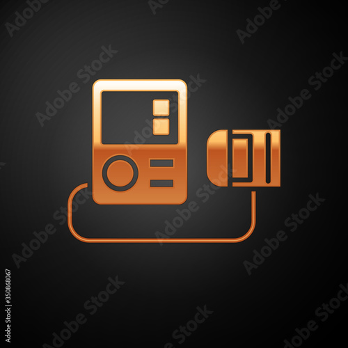 Gold Blood pressure icon isolated on black background. Vector