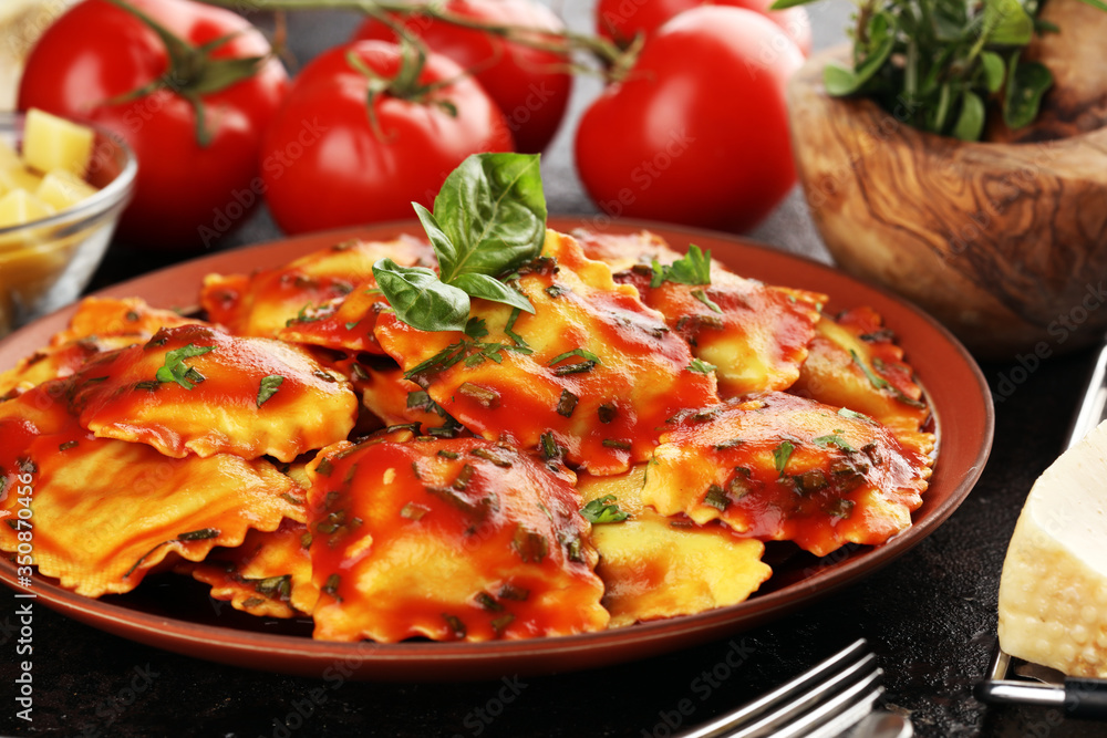 Ravioli with tomato sauce and basil. Fresh homemade ravioli Ravioli with tomato sauce and basil. Fresh homemade ravioli