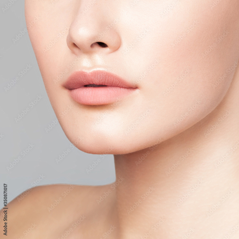 Obraz premium Anonymous portrait of young beautiful girl. Lips close up