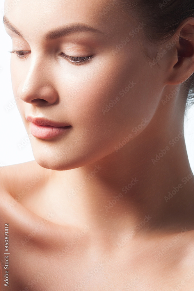 Young beautiful woman with clean perfect skin close-up Young beautiful woman with clean perfect skin close-up