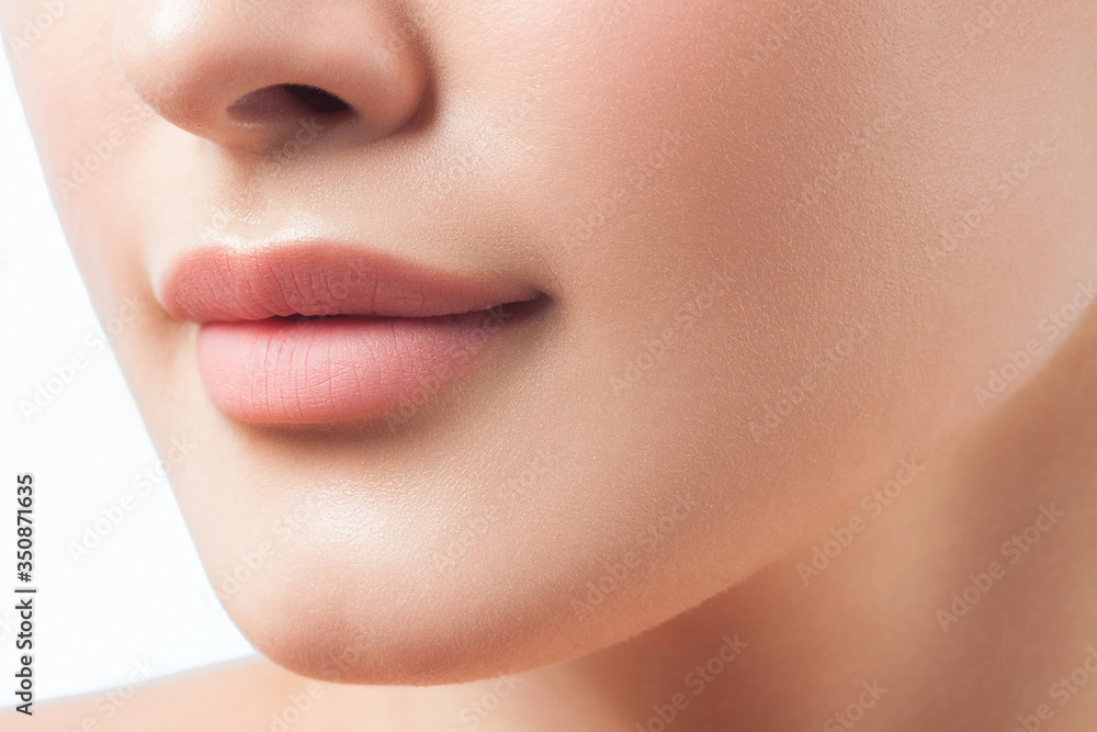 Anonymous portrait of young beautiful girl. Lips close up Anonymous portrait of young beautiful girl. Lips close up