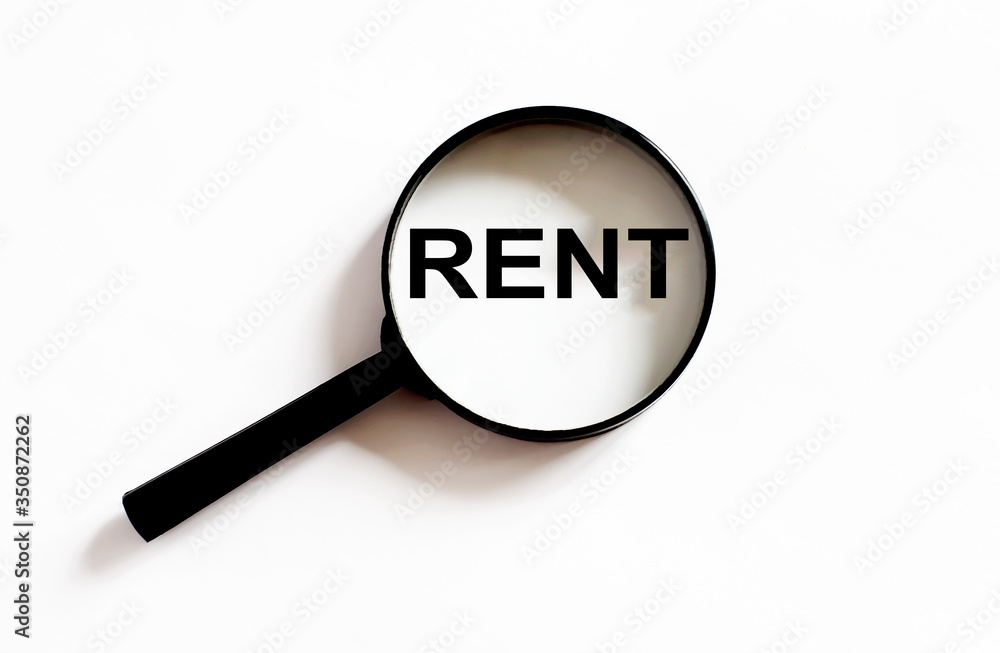 Magnifier with text Rent on the white background Magnifier with text Rent on the white background
