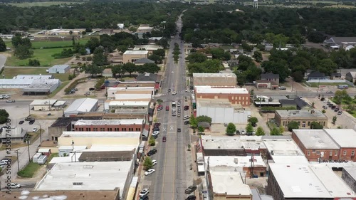 Traffic in a small town downtown, Navasota, Texas, USA photo