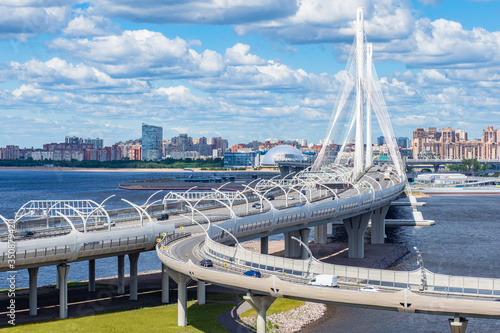 Saint Petersburg. Russia. Cable-stayed bridge over the Neva river. Bridges Of St. Petersburg. Rivers Of St. Petersburg. Big Obukhovsky bridge. Car traffic in the city. Transport infrastructure. photo