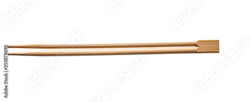Disposable wooden chopsticks for japanese, chinese, korean or asian food isolated on white background.
