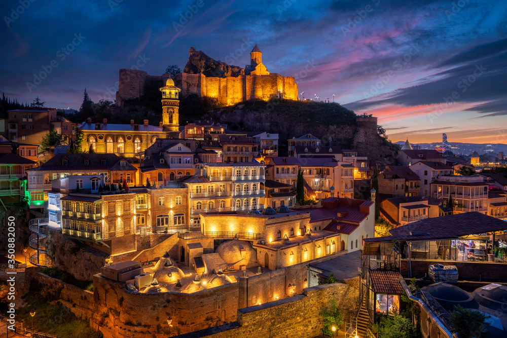 Beautiful panoramic shot of Tbilisi at sunset Beautiful panoramic shot of Tbilisi at sunset
