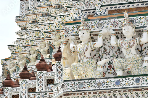 The sculpture of Guardian angle decorate at Prang building in Wat Arun Ratchawararam Ratchawaramahawihan (After big renovate)
