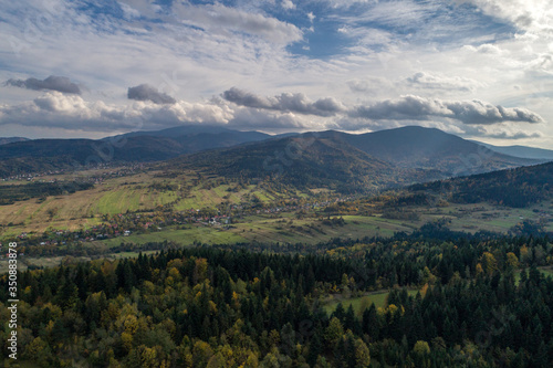 Fototapeta Naklejka Na Ścianę i Meble -  Beskid mountains in Zywiec Poland, Polish mountains and hills aerial drone photo