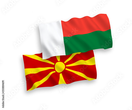 Flags of Madagascar and North Macedonia on a white background
