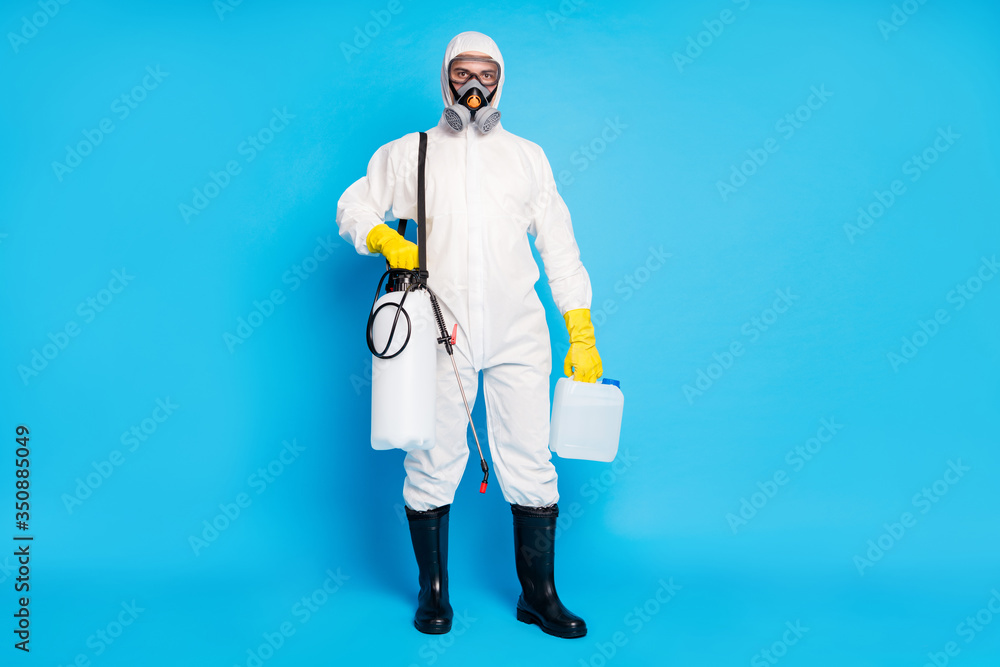 Φωτογραφία Full length photo of medical man worker hold plastic canister chemicals equipmen