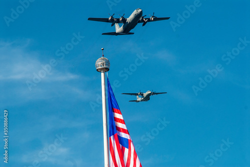 Malaysian flag and military aircraft during Independence Day, Kuala Lumpur, Malaysia