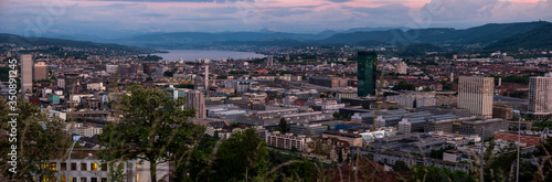 Zurich city Switzerland panorama from famous vista point in the evening after sunset cloudy sky © Octavian