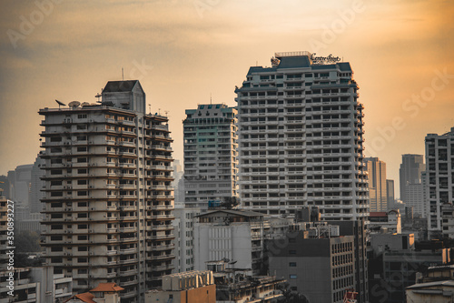 Asoke intersection and sky train station in Bangkok Thailand photo