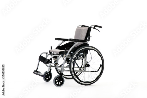 Obraz na płótnie wheelchair isolated on white background, Wheelchair isolated under the white background w salonie