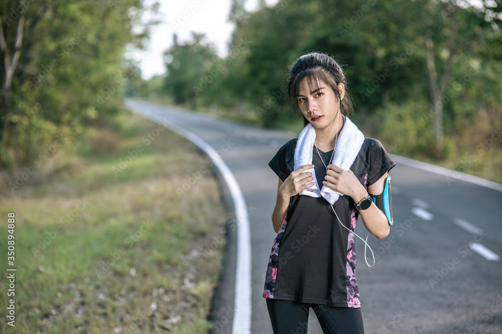 Woman standing Relax after exercise. Woman standing Relax after exercise.
