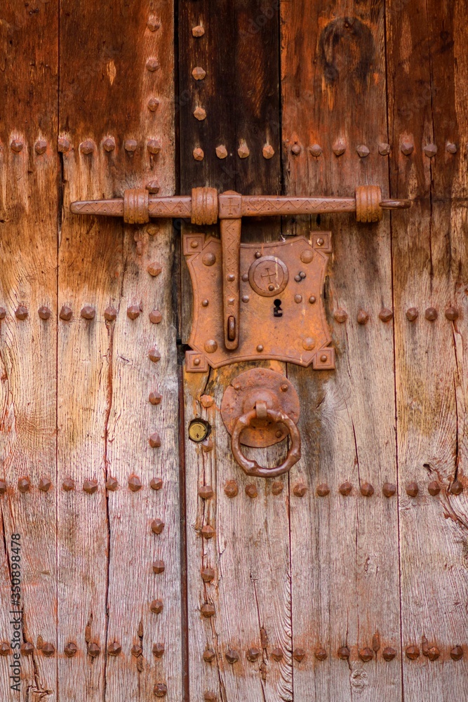 An old door of Sant Martí d'Ogassa, a church in the Pyrenees in Catalonia An old door of Sant Martí d'Ogassa, a church in the Pyrenees in Catalonia