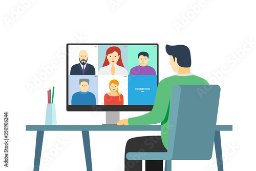 Man using computer with people group on screen taking part online conference. Home work meeting and distance education webinar or videoconferencing. Video conferencing and remote web communication