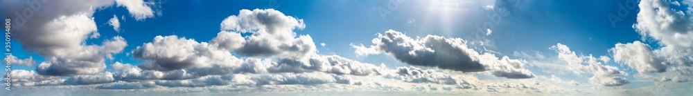 Fototapeta premium Fantastic clouds against blue sky, panorama